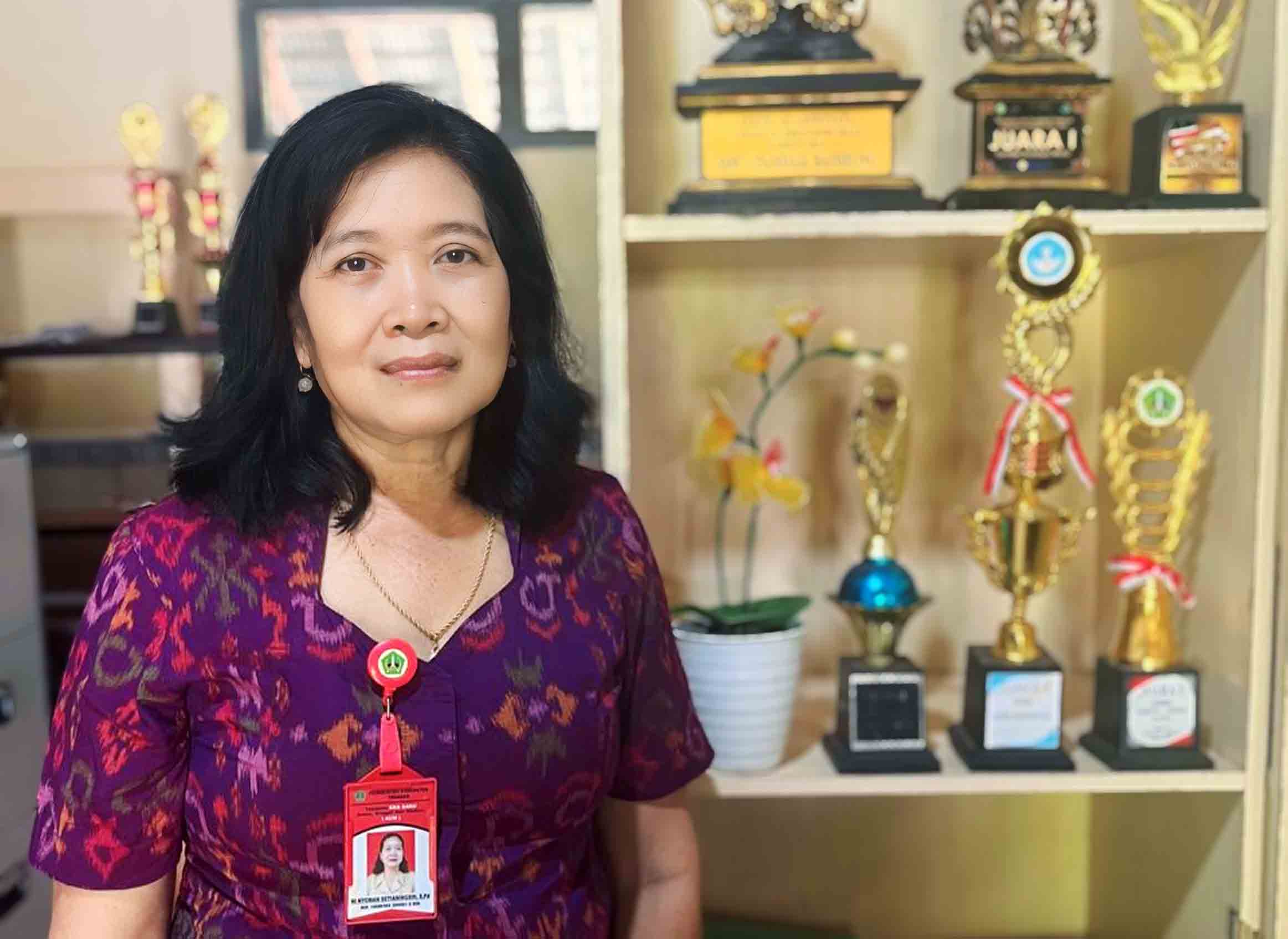 <center>Kepala Sekolah<br>Ni Nyoman Setianingsih</center>